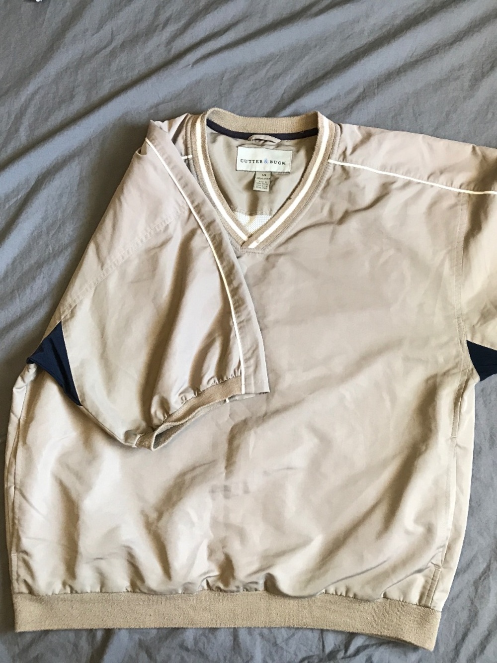 Cutter and Buck lined golf shirt.